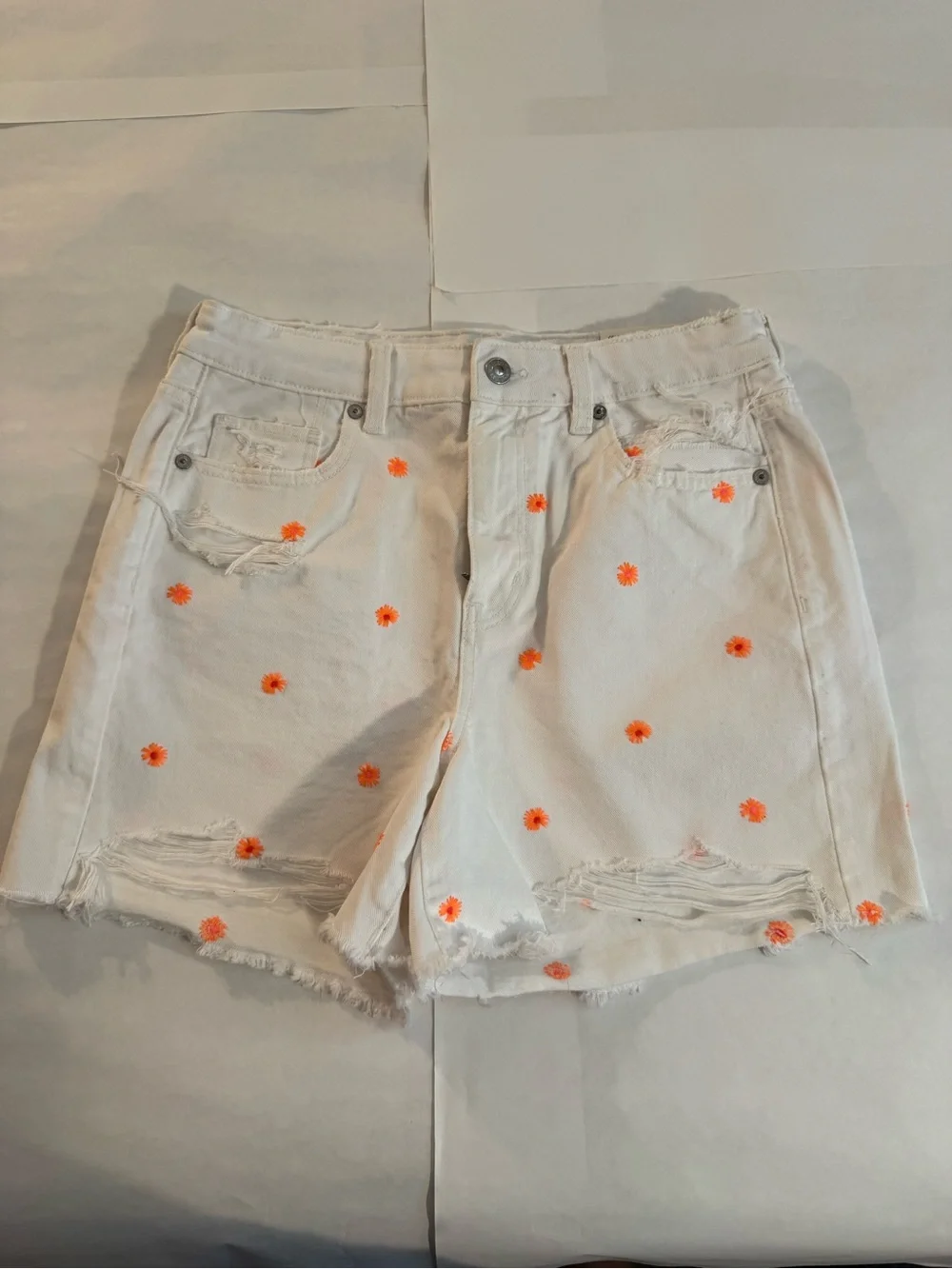 American Eagle Outfitters White Denim Shorts with Orange Daisy Embroidery